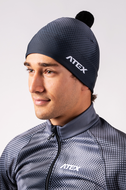 Sports cap with two layers and pompom